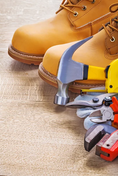 Hammer, boots, nippers, cutter — Stock Photo, Image