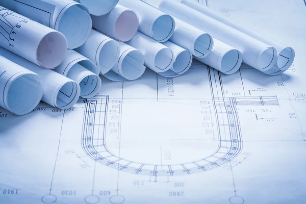 Heap of rolled up construction drawings — Stock Photo, Image