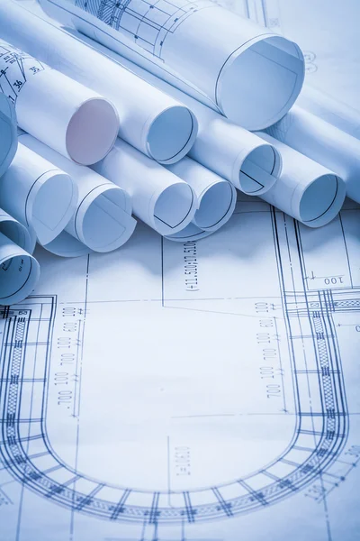 Pile of rolled up construction plans — Stock Photo, Image