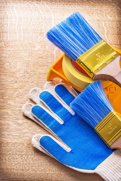 Working gloves paint brushes — Stock Photo, Image