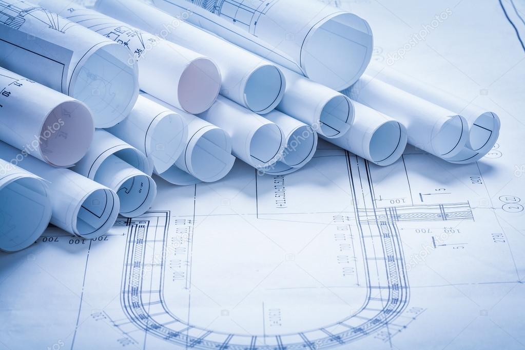 Variety of rolled up construction plans