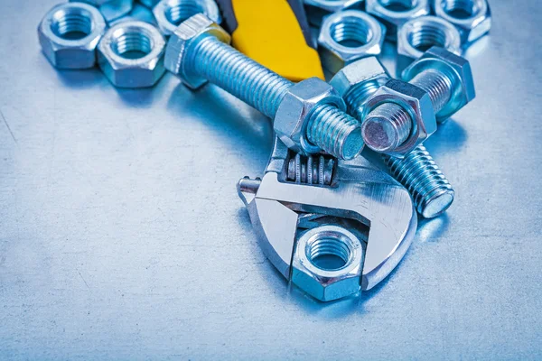 Adjustable key, bolt and screw nuts — Stock Photo, Image