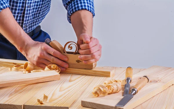 Work with woodworkers plane by joiner — Stock Photo, Image