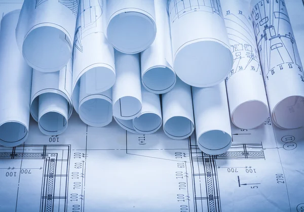 Composition of blueprint rolls — Stock Photo, Image