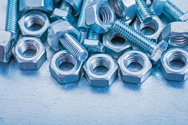 Heap of metal bolts and nuts — Stock Photo, Image