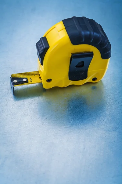 Yellow plastic tape measure — Stock Photo, Image