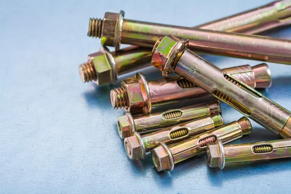 Metal anchor bolts with construction nuts — Stock Photo, Image