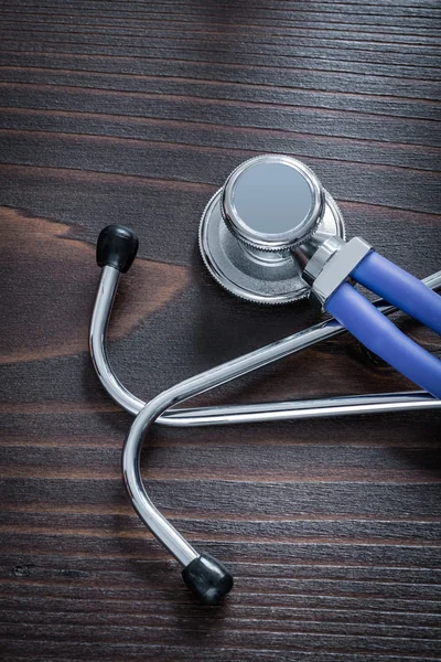 Stethoscope on wooden background — Stock Photo, Image