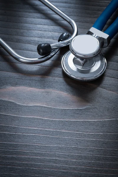 Stethoscope on wooden board — Stock Photo, Image