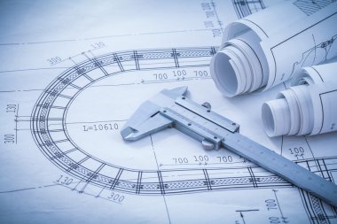 Construction plans, vernier caliper on blueprint