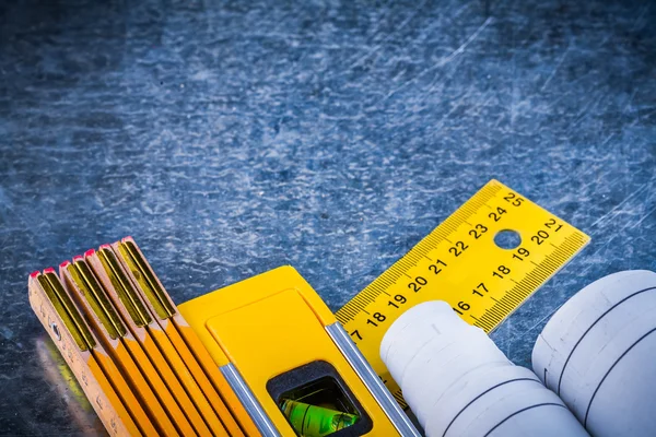 Blueprints, yellow ruler, construction level — Stock Photo, Image