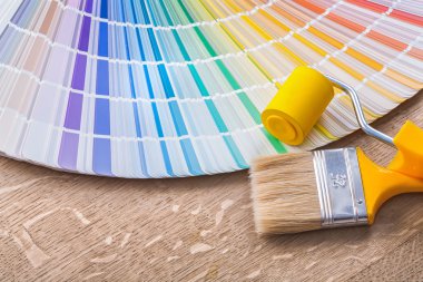 Paint brush, roller and color palette