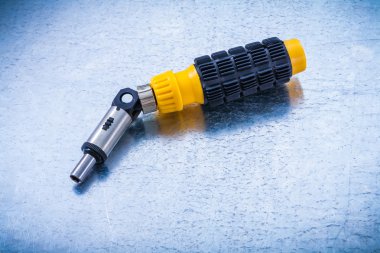 Reversible screwdriver, construction concept