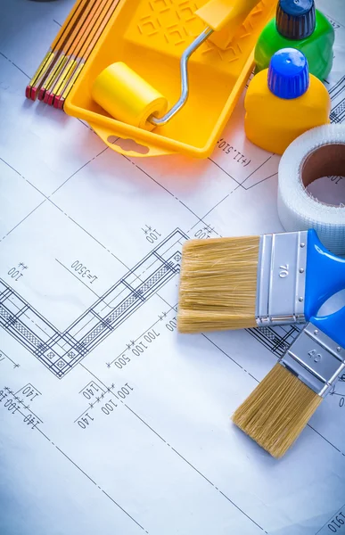 Construction plan with paint roller — Stock Photo, Image