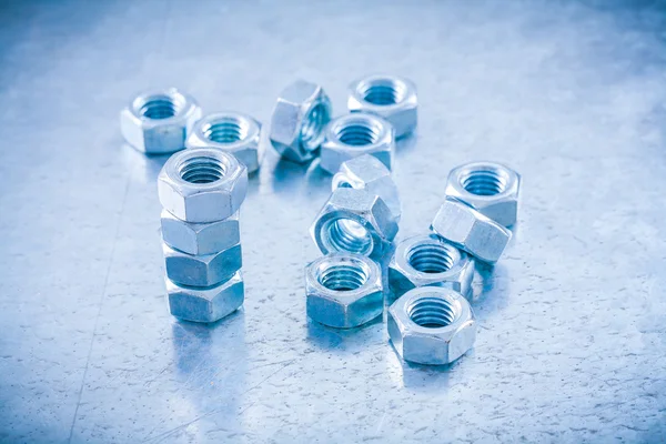 Metal threaded screw nuts — Stockfoto