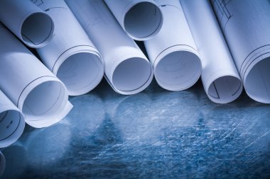 Set of rolled up construction drawings