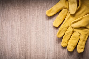 Pair of yellow leather safety gloves