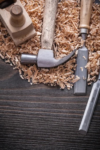 Claw hammer, chisels, planning chips — Stok fotoğraf