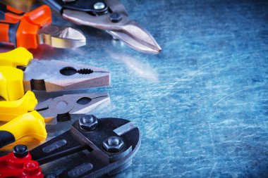 Bolt cutter, tin snips, pliers