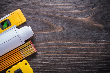 Blueprints, construction level, measuring tape