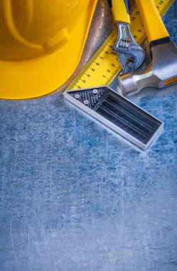 Hard hat, claw hammer, ruler