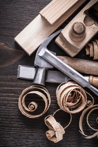 Planer, hammer, chisels, wooden studs — 스톡 사진