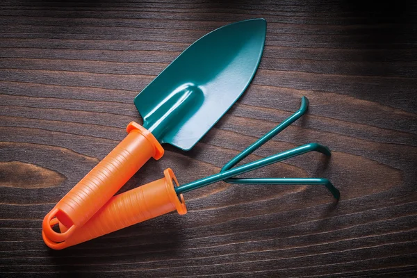 Hand gardening shovel with rake — Stok fotoğraf