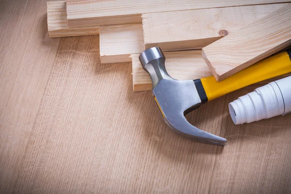 Wooden planks, hammer, construction plans — Stock Photo, Image