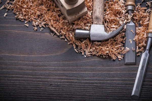 claw hammer and flat chisels wooden planer