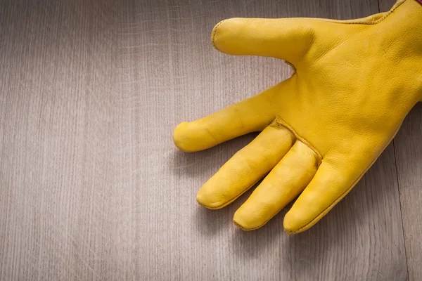 Gelber Gartenhandschuh aus Leder — Stockfoto