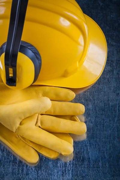 Hard hat, ear muffs and gloves — Stock Photo, Image