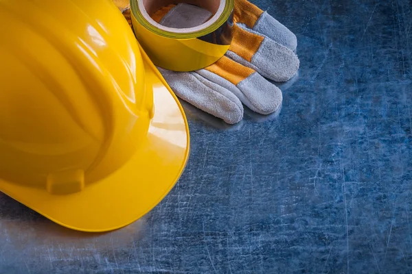 Safety tape, helmet and protective gloves — Stock Photo, Image