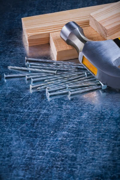Metal nails with claw hammer — Stock Photo, Image