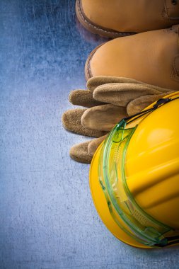 leather gloves, boots, hard hat