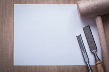 Firmer chisels, lump hammer and paper