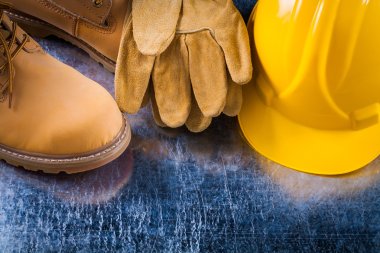 boots, protective gloves and hard hat