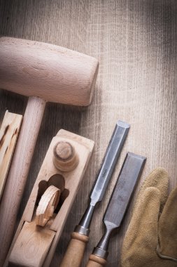 mallet, shaving plane, leather gloves