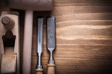 Wooden hammer, shaving plane, chisels