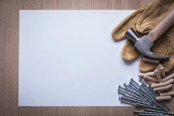 Paper, nails, hammer, pins and gloves — Stockfoto