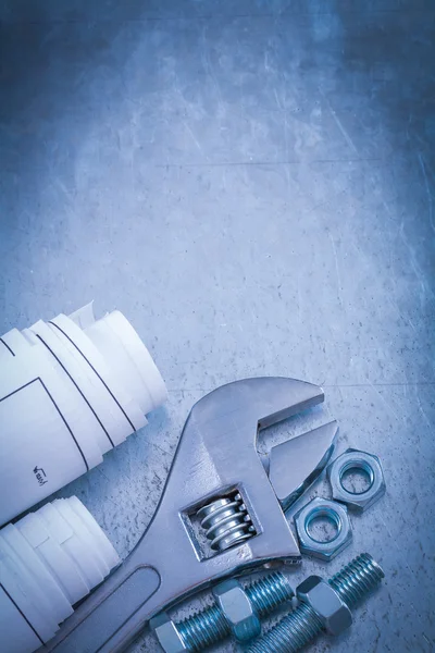 Adjustable wrench, screw-nuts, bolts — Stock Photo, Image