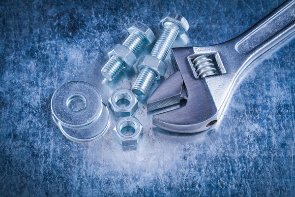 Adjustable wrench, bolt washers and screwbolts — Stock Photo, Image