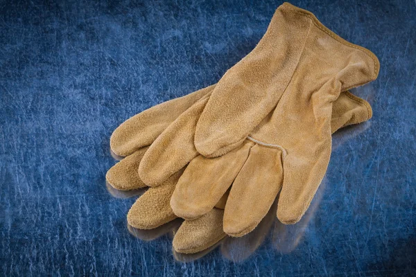 Pair of leather brown protective gloves — Stok fotoğraf