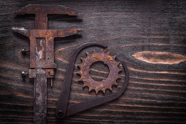 Rusted measuring calipers with gear wheel