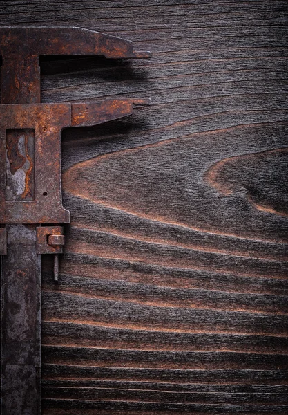 Rusted antique measuring slide caliper — Stock Photo, Image