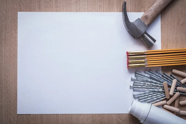 Wooden meter, plans, nails, hammer