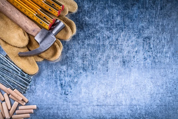 Hammer, gloves, meter, nails and dowels — Stock Image Hammer, gloves, meter, nails and dowels Stock Picture