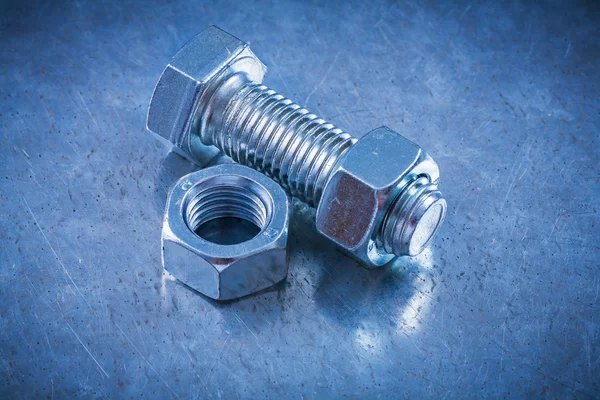 Stainless screwbolt and screw-nuts — Stock Photo, Image