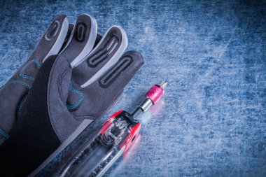 Kumaş Emanet eldiven Metalik arka plan üzerinde