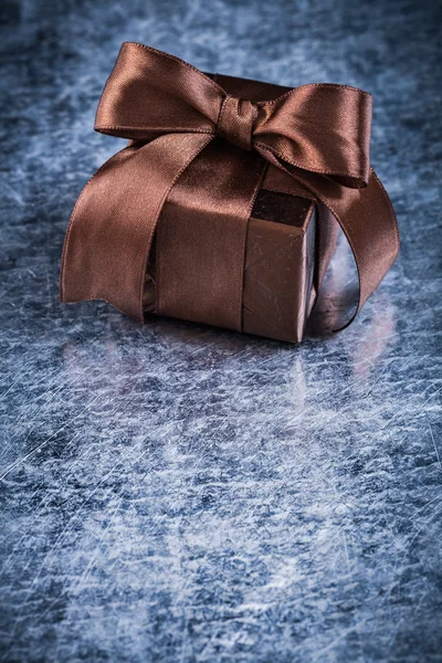 Boxed present with tied bow — Stock Photo, Image