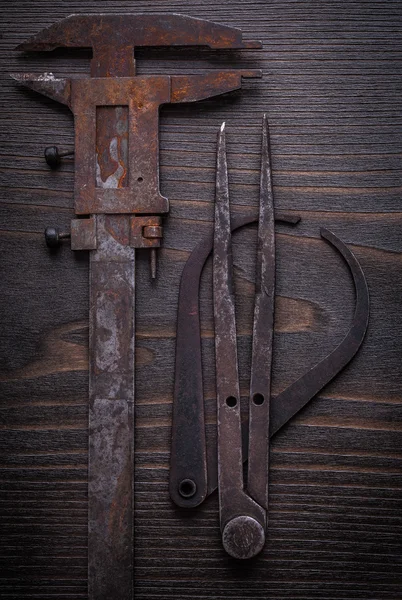 Old-fashioned vernier scales on wood — Stock Photo, Image